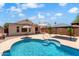 Backyard view of in-ground pool, covered patio, and shaded gazebo at 316 W Kelton Ln, Phoenix, AZ 85023