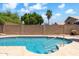 A beautiful pool and spacious backyard with a block fence for privacy at 316 W Kelton Ln, Phoenix, AZ 85023