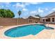 A beautiful pool and spacious backyard with a block fence for privacy at 316 W Kelton Ln, Phoenix, AZ 85023