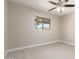 A bright bedroom with carpet, ceiling fan, and one window allowing natural light at 3209 N 20Th Pl, Phoenix, AZ 85016