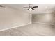 Bright living room with recessed lighting, tile floors, neutral paint, and large window at 3209 N 20Th Pl, Phoenix, AZ 85016