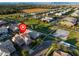 Community aerial view showcasing the home's location near a park, playground, and community sports court at 3556 E Austin Dr, Gilbert, AZ 85296