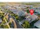 Aerial view of a beautiful home in a well-planned neighborhood with mature landscaping at 3556 E Austin Dr, Gilbert, AZ 85296