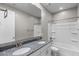 Bathroom features double sinks with granite counters and a shower-tub combo at 3556 E Austin Dr, Gilbert, AZ 85296