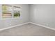 Bright bedroom featuring soft carpet, and a window with stylish shutters at 3556 E Austin Dr, Gilbert, AZ 85296