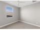 Bedroom featuring soft carpet, neutral paint, and a bright window at 3556 E Austin Dr, Gilbert, AZ 85296