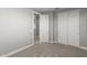 Neutral bedroom featuring soft carpet, gray walls, and a closet at 3556 E Austin Dr, Gilbert, AZ 85296