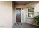 Inviting front entrance features a sleek door, narrow sidelight window, and a cheerful welcome mat at 3556 E Austin Dr, Gilbert, AZ 85296