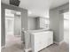 Hallway with soft carpet, and white cabinets for extra storage at 3556 E Austin Dr, Gilbert, AZ 85296