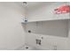 Utility room featuring white walls and tile flooring at 3556 E Austin Dr, Gilbert, AZ 85296