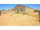 A spacious backyard featuring a play set and a concrete patio at 3611 E Archer Dr, San Tan Valley, AZ 85140