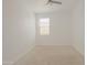 Bedroom featuring neutral carpet, fan and a bright window at 3611 E Archer Dr, San Tan Valley, AZ 85140