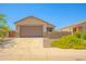 Charming single-story home featuring a two-car garage, desert landscaping, and stone accents on the facade at 3611 E Archer Dr, San Tan Valley, AZ 85140