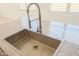 Close up of an island sink featuring granite countertops and tile flooring at 3611 E Archer Dr, San Tan Valley, AZ 85140