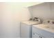 Laundry room with white washer and dryer at 3611 E Archer Dr, San Tan Valley, AZ 85140