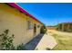View of the backyard featuring a well-kept lawn and a charming patio at 3936 E Oak St, Phoenix, AZ 85006
