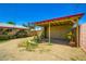 Image featuring the carport with a stylish roof and a well-maintained garden at 3936 E Oak St, Phoenix, AZ 85006
