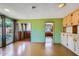 Bright living room featuring large windows and a view into the kitchen at 3936 E Oak St, Phoenix, AZ 85006