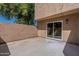 Empty back patio featuring a sliding glass door with access to the home's interior at 4268 N 68Th Ave, Phoenix, AZ 85033