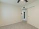 Comfortable bedroom with carpet floors and a closet offering ample storage space at 4268 N 68Th Ave, Phoenix, AZ 85033