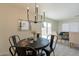 Inviting dining area leads to the living area with plenty of natural light at 4268 N 68Th Ave, Phoenix, AZ 85033