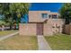 The exterior of a property with an enclosed yard and walkway leading up to the entrance at 4268 N 68Th Ave, Phoenix, AZ 85033