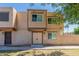 Charming townhouse featuring a neutral color scheme, a private front entrance, and well-maintained landscaping at 4268 N 68Th Ave, Phoenix, AZ 85033