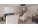 Comfortable living room with modern decor, stylish furnishings, a cozy seating area, and a convenient staircase at 4268 N 68Th Ave, Phoenix, AZ 85033