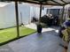 Cozy backyard with artificial turf, concrete patio, and grill at 4729 W Eva St, Glendale, AZ 85302