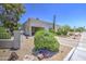 Well-kept home exterior featuring low-maintenance desert landscaping and attached carport for convenient parking at 5335 N 78Th St, Scottsdale, AZ 85250