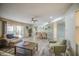 Open-concept living area featuring stylish furniture, wood floors, and a dining area, perfect for entertaining at 5335 N 78Th St, Scottsdale, AZ 85250