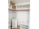 Spacious walk-in closet with built-in shelving and drawers for ample storage at 5735 E Mcdowell Rd # 436, Mesa, AZ 85215