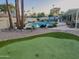 Expansive backyard showcasing a putting green, refreshing pool, and ample space for outdoor recreation and relaxation at 6639 E Pershing Ave, Scottsdale, AZ 85254