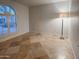 Well-lit bedroom featuring tiled floors, awaiting personalization and decor at 6639 E Pershing Ave, Scottsdale, AZ 85254