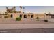 Attractive home with manicured desert landscaping, offering curb appeal and a welcoming entrance at 6639 E Pershing Ave, Scottsdale, AZ 85254