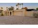 Well-maintained home showcasing desert-friendly landscaping and an attached two-car garage at 6639 E Pershing Ave, Scottsdale, AZ 85254