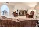 Stylish living room with modern decor featuring leather couches and rustic furniture at 6639 E Pershing Ave, Scottsdale, AZ 85254