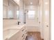 Stylish bathroom featuring double sinks, sleek fixtures, subway tile, and a tub-shower combo at 8226 W Swansea Dr, Arizona City, AZ 85123