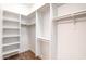 Bright walk-in closet offers built-in shelving and organized storage solutions at 8226 W Swansea Dr, Arizona City, AZ 85123