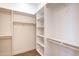 Generous walk-in closet with ample storage and built-in shelving at 8226 W Swansea Dr, Arizona City, AZ 85123