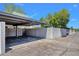 Carport area with a wall for privacy, perfect for keeping your vehicle secure at 8329 E Keim Dr, Scottsdale, AZ 85250