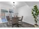 Charming dining area with modern table set and sliding glass door at 8329 E Keim Dr, Scottsdale, AZ 85250