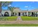 Charming home exterior with lush landscaping, a cozy entrance, and a well-manicured lawn at 8329 E Keim Dr, Scottsdale, AZ 85250