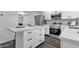 Bright kitchen with white cabinets, stainless steel appliances, and a functional island at 8329 E Keim Dr, Scottsdale, AZ 85250