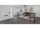 Inviting living room with wood floors, neutral walls, stylish decor, and natural light at 8329 E Keim Dr, Scottsdale, AZ 85250