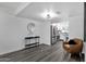 Open floor plan with wood floors seamlessly flows into a modern kitchen at 8329 E Keim Dr, Scottsdale, AZ 85250