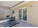 Cozy patio with covered area, seating, and sliding door access to the home at 8329 E Keim Dr, Scottsdale, AZ 85250