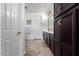 Bathroom featuring a large vanity with ample storage and white trim at 20891 E Cattle Dr, Queen Creek, AZ 85142
