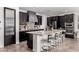 Modern kitchen with granite countertops, stainless steel appliances, and center island at 20891 E Cattle Dr, Queen Creek, AZ 85142
