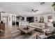 Spacious living room with tile flooring, neutral decor, and an open floor plan at 20891 E Cattle Dr, Queen Creek, AZ 85142